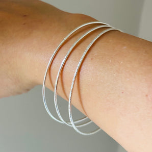Sterling silver textured bangle set