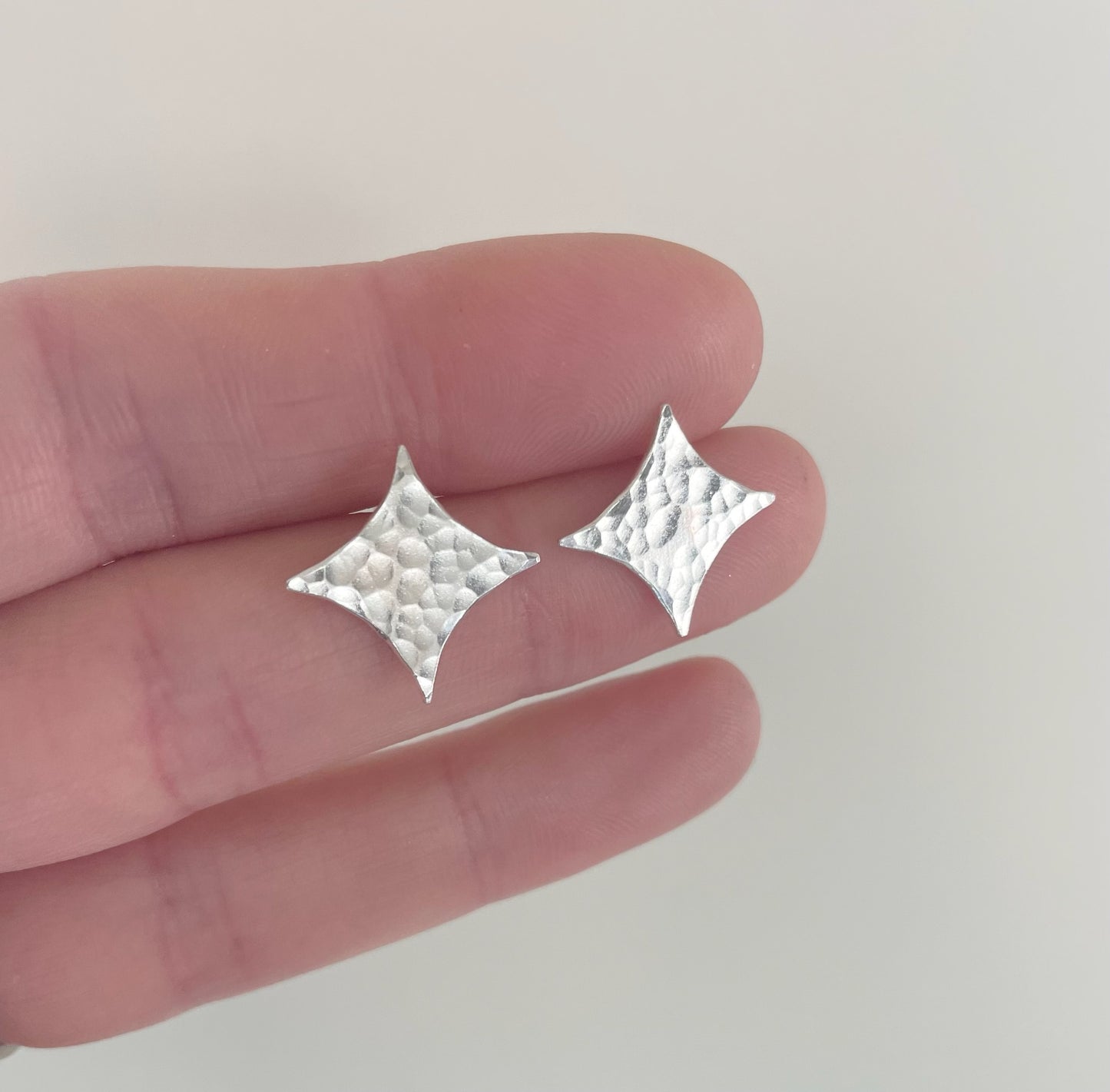 Silver star stud earrings