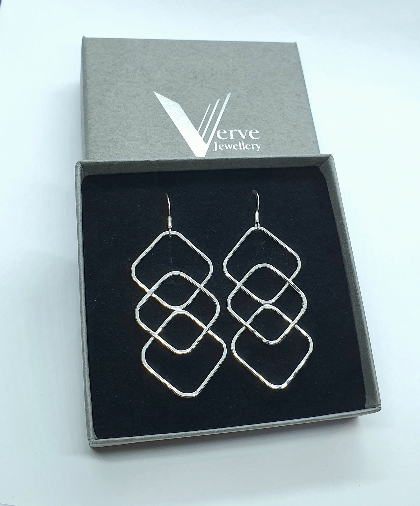 Large silver geometric statement earrings