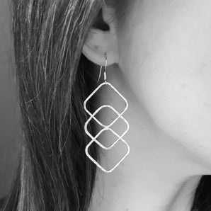 Large silver geometric statement earrings