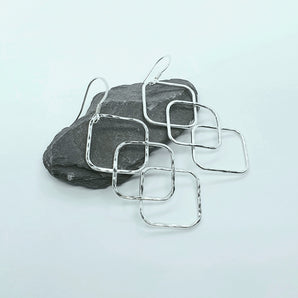 Large silver geometric statement earrings