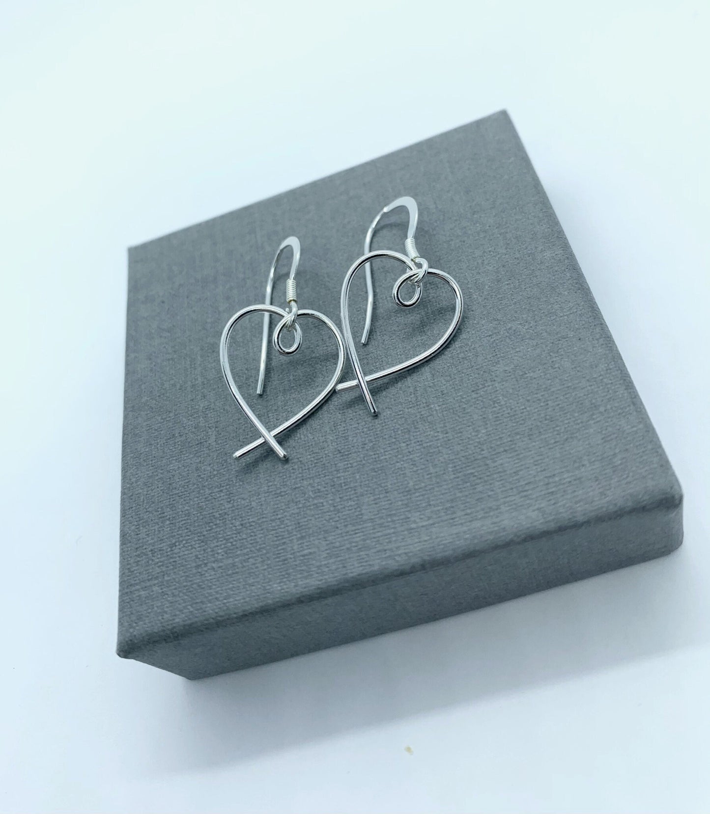 Small silver heart earrings