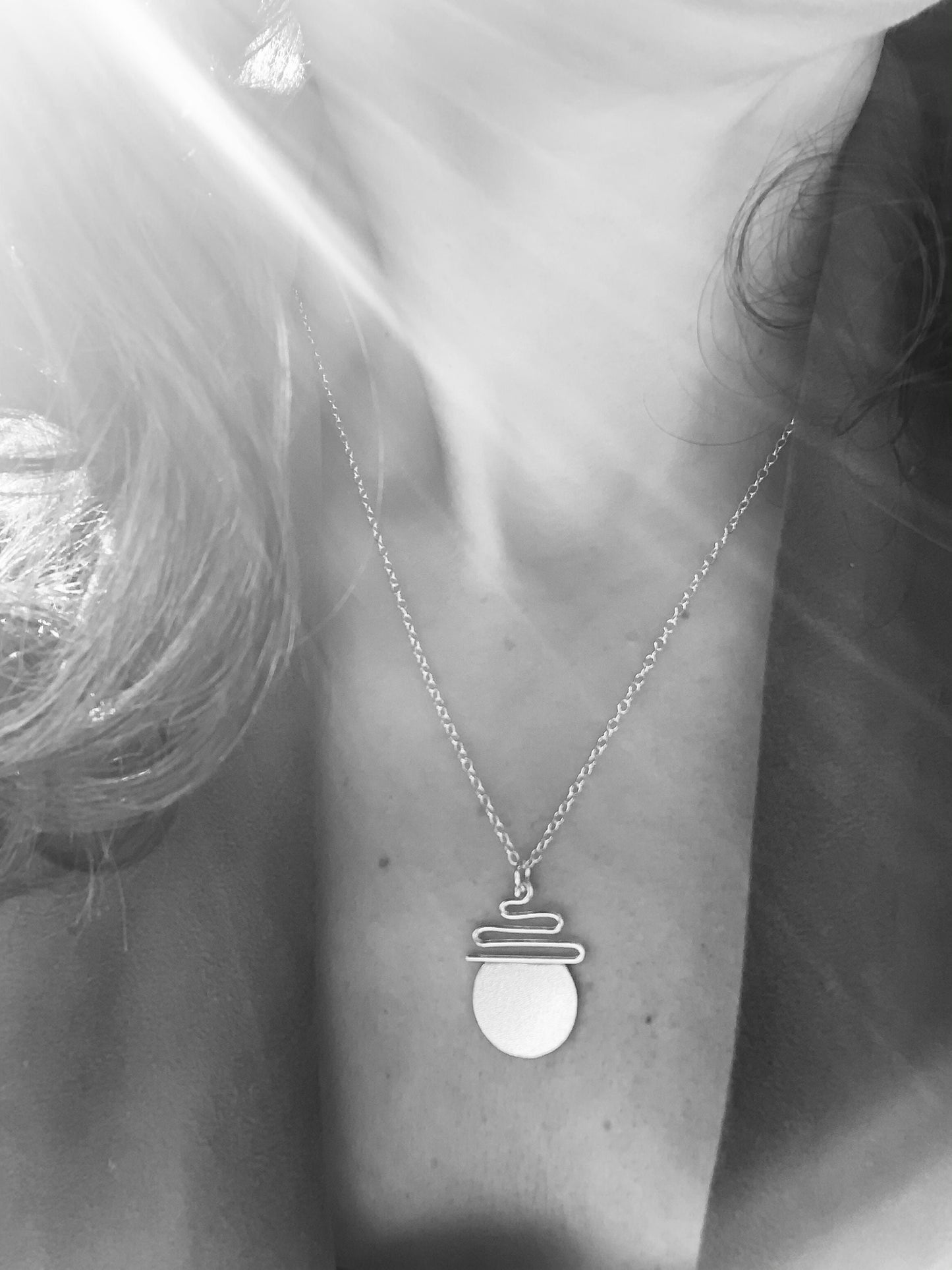 Silver sunrise necklace